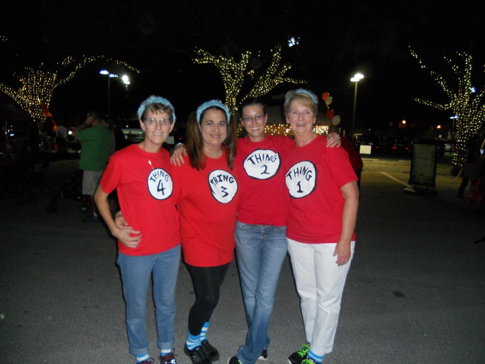 Women dressed as Things 1, 2, 3 and 4